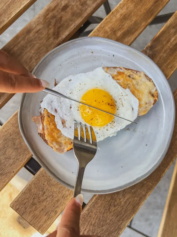 All In One breakfast plate with eggs and sourdough